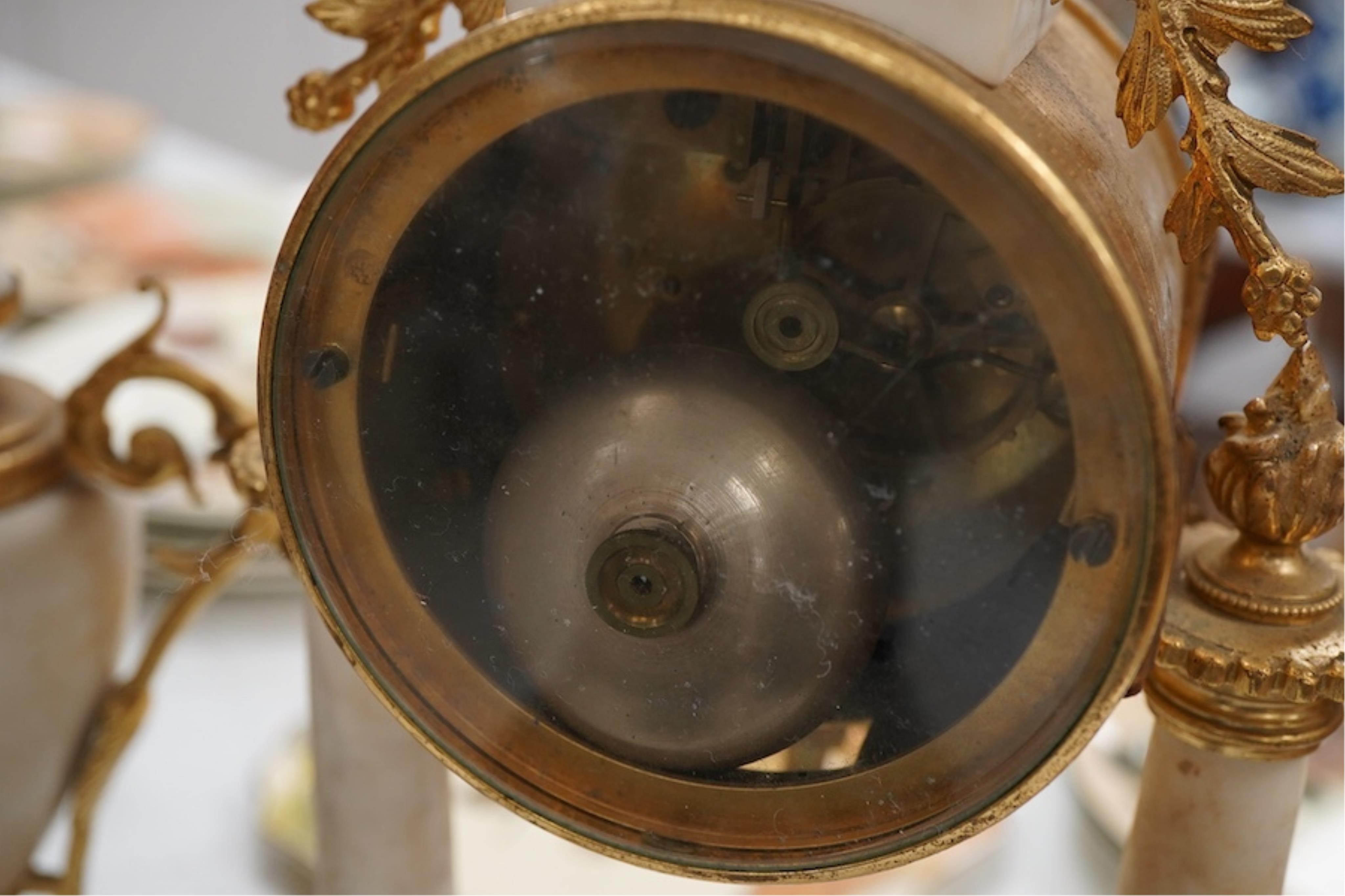 A late 19th century French gilt metal mounted clock garniture, 41cm